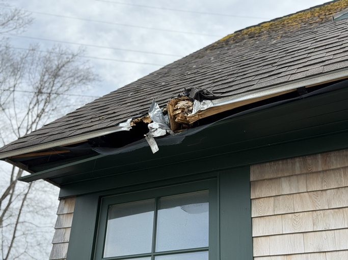 Roofing contractor repairing storm damage in McDonough Georgia