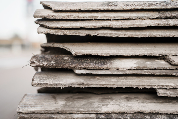 Technician performing professional asbestos abatement